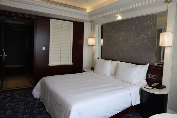 Imagen de la habitación del Hotel Dalong Century Bojun. Foto 12