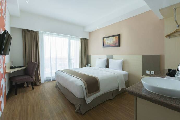 Imagen de la habitación del Hotel Dalton Makassar. Foto 22