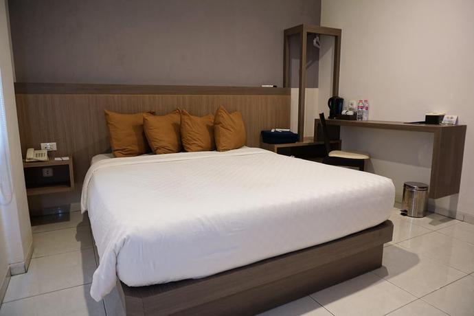 Imagen de la habitación del Hotel Dalu Hotel. Foto 5