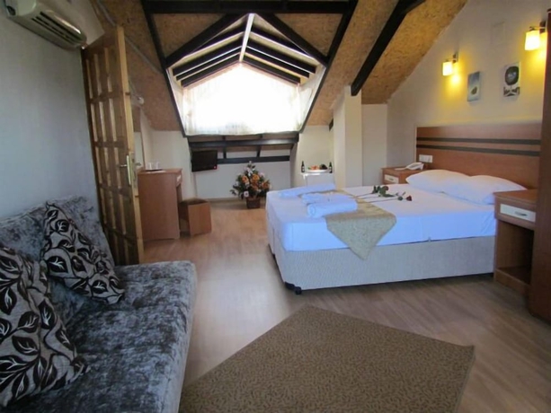 Imagen de la habitación del Hotel Dalyan Palmiye Resort. Foto 2