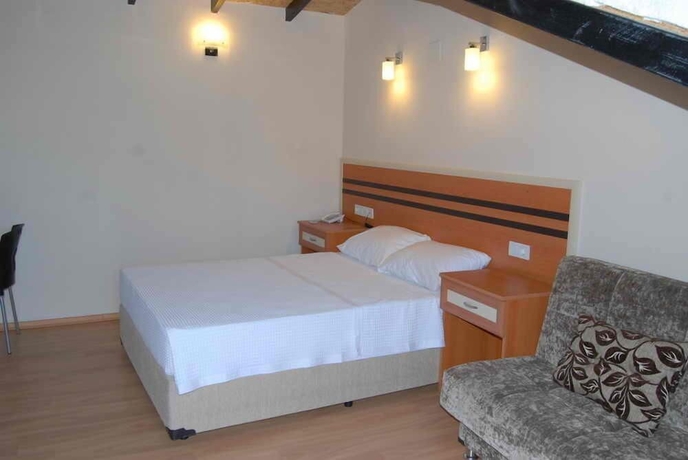 Imagen de la habitación del Hotel Dalyan Palmiye Resort. Foto 4