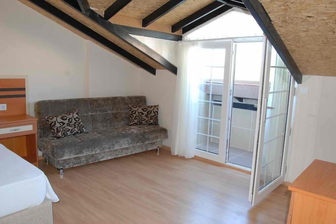 Imagen de la habitación del Hotel Dalyan Palmiye Resort. Foto 5
