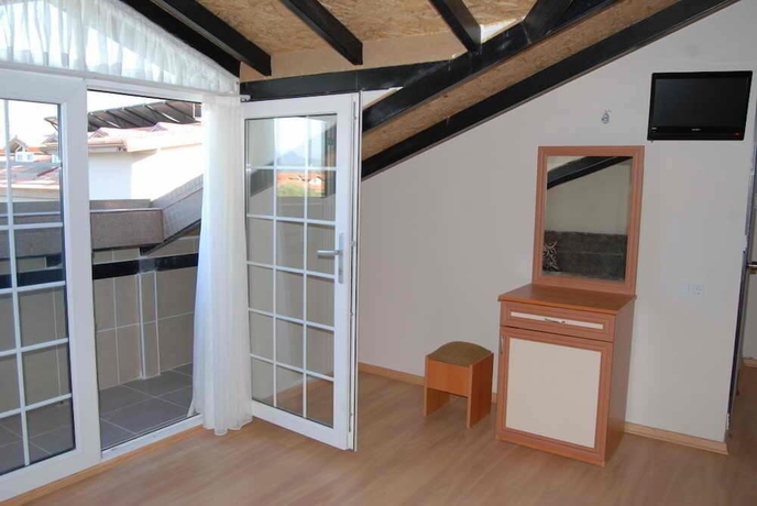 Imagen de la habitación del Hotel Dalyan Palmiye Resort. Foto 14