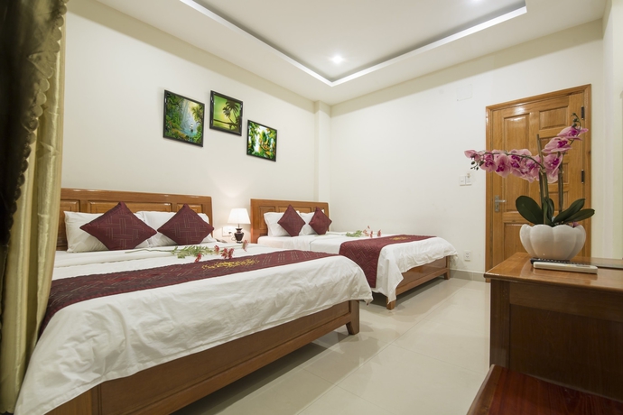 Imagen de la habitación del Hotel Dam Tien. Foto 13