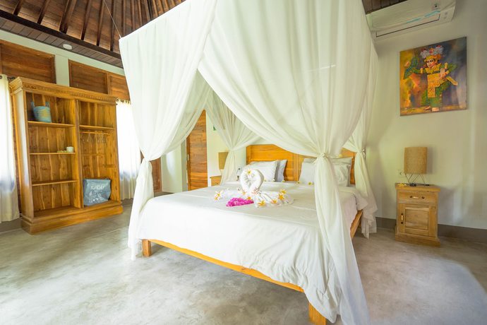 Imagen de la habitación del Hotel Damar Sanjaya Uttama. Foto 6