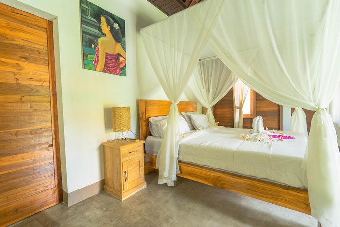Imagen de la habitación del Hotel Damar Sanjaya Uttama. Foto 9