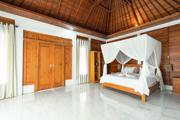 Imagen de la habitación del Hotel Damar Sanjaya Uttama. Foto 11