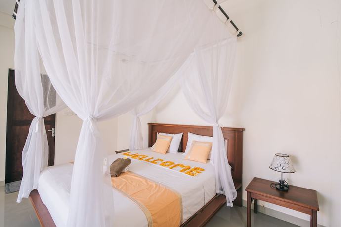 Imagen de la habitación del Hotel Damar Sanjaya Uttama. Foto 12