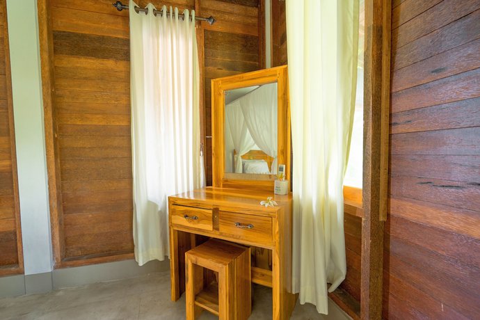 Imagen de la habitación del Hotel Damar Sanjaya Uttama. Foto 14