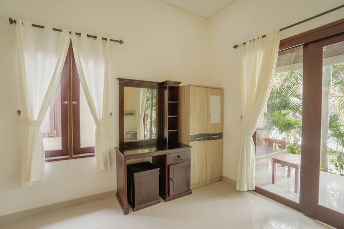 Imagen de la habitación del Hotel Damar Sanjaya Uttama. Foto 15