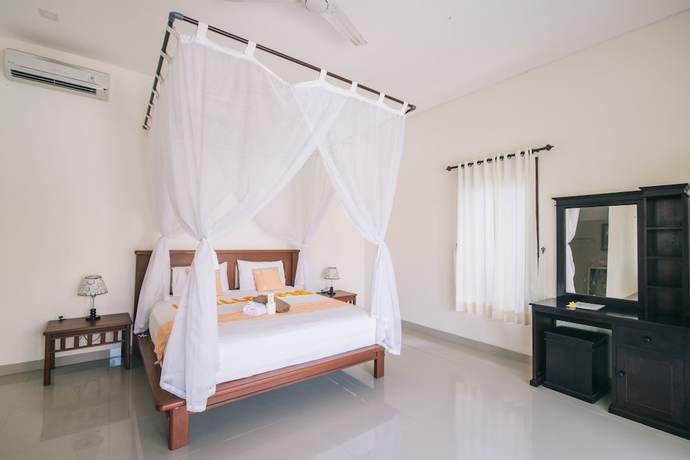 Imagen de la habitación del Hotel Damar Sanjaya Uttama. Foto 17