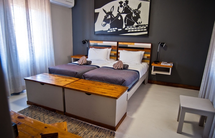 Imagen de la habitación del Hotel Damara Mopane Lodge. Foto 7