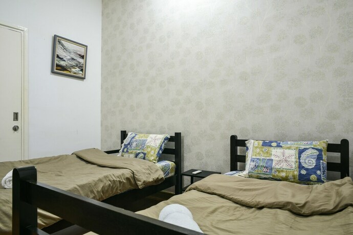 Imagen de la habitación del Hotel Damen Homestay. Foto 34