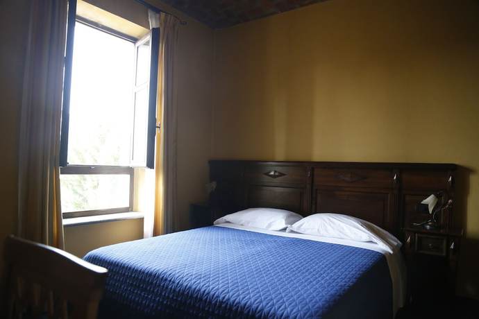 Imagen de la habitación del Hotel Damian. Foto 14