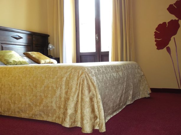 Imagen de la habitación del Hotel Damian. Foto 17