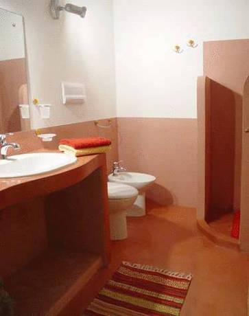 Imagen de la habitación del Hotel Dammusi Sciuvechi Resort. Foto 3