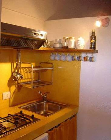 Imagen de la habitación del Hotel Dammusi Sciuvechi Resort. Foto 8