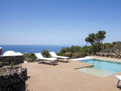 Imagen de la habitación del Hotel Dammusi Sciuvechi Resort. Foto 12