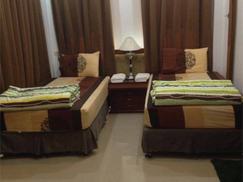 Imagen de la habitación del Hotel Damnoen Care Resort. Foto 2