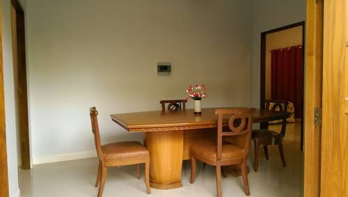 Imagen de la habitación del Hotel Damnoen Care Resort. Foto 15