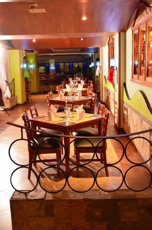 Imagen del bar/restaurante del Hotel D&D Inn Tibana Caracas. Foto 2