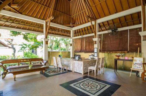 Imagen de la habitación del Hotel Dampati Villas. Foto 3