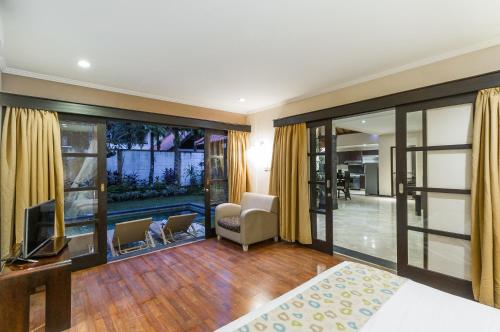 Imagen de la habitación del Hotel Dampati Villas. Foto 4