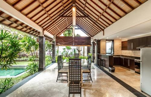 Imagen de la habitación del Hotel Dampati Villas. Foto 5