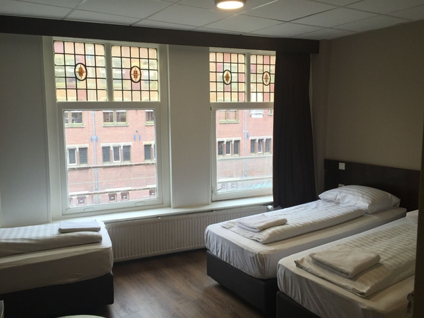 Imagen de la habitación del Hotel Damrak-Inn. Foto 3