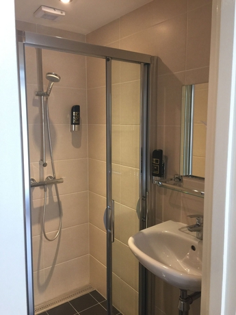 Imagen de la habitación del Hotel Damrak-Inn. Foto 8