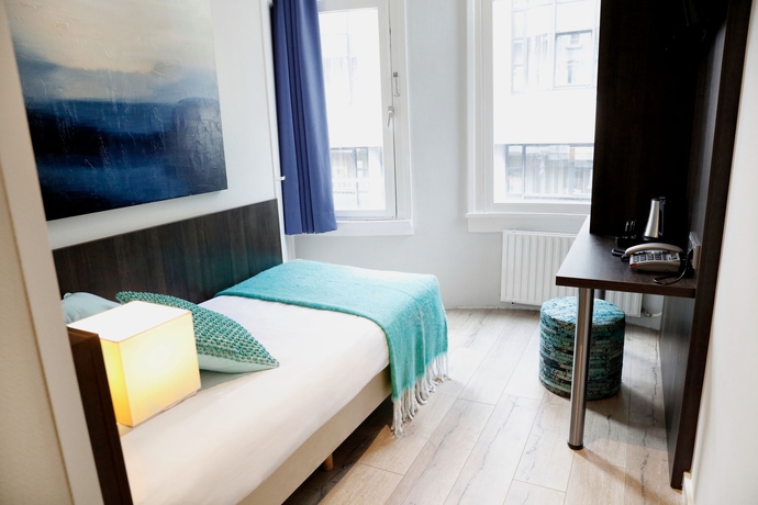 Imagen de la habitación del Hotel Damsquare. Foto 2