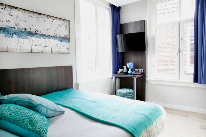 Imagen de la habitación del Hotel Damsquare. Foto 3