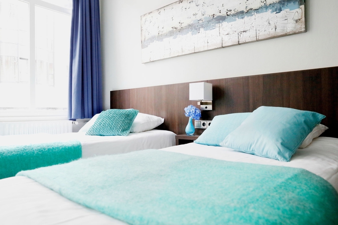 Imagen de la habitación del Hotel Damsquare. Foto 5