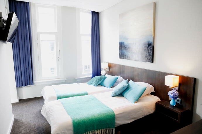 Imagen de la habitación del Hotel Damsquare. Foto 6