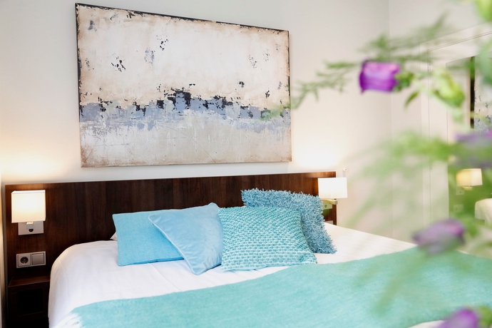 Imagen de la habitación del Hotel Damsquare. Foto 7