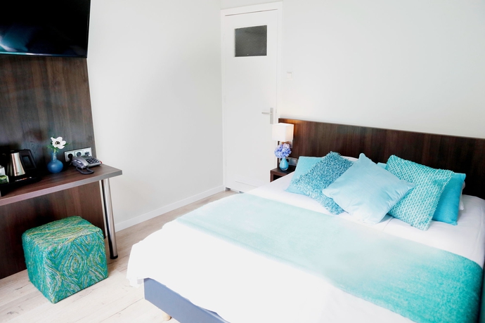 Imagen de la habitación del Hotel Damsquare. Foto 12