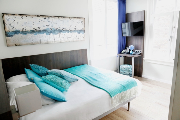 Imagen de la habitación del Hotel Damsquare. Foto 13