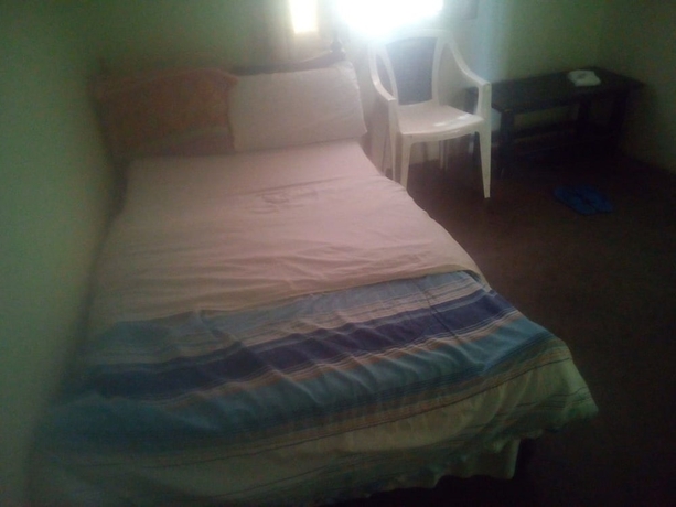 Imagen de la habitación del Hotel Damuku Guest House Eldoret. Foto 8