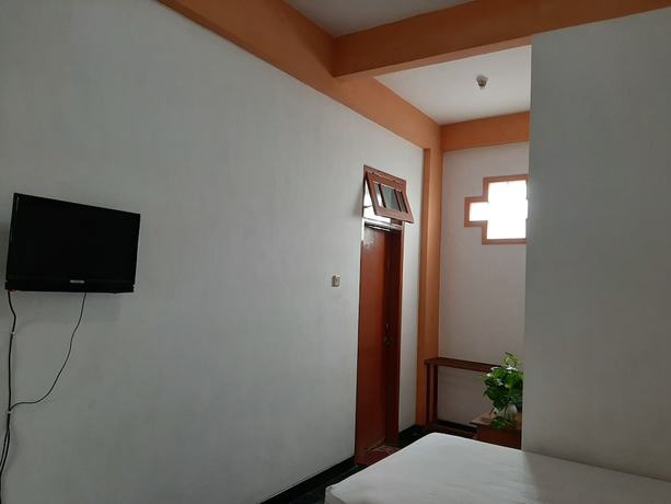 Imagen de la habitación del Hotel Dana Jogja. Foto 4
