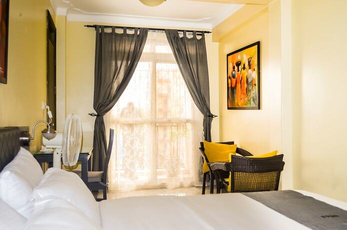 Imagen de la habitación del Hotel Dana, Kampala. Foto 17