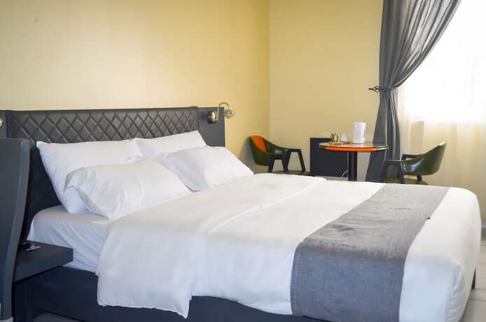 Imagen de la habitación del Hotel Dana, Kampala. Foto 18