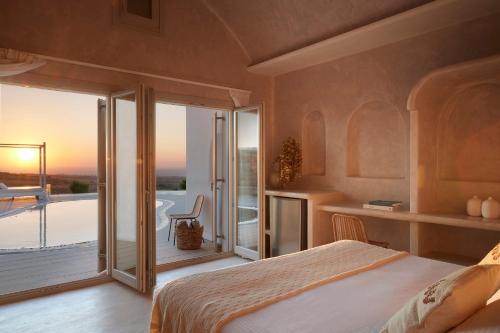 Imagen de la habitación del Hotel Danae Suites Santorini. Foto 13