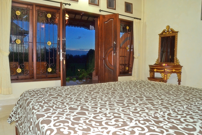 Imagen de la habitación del Hotel Danasari Homestay. Foto 11