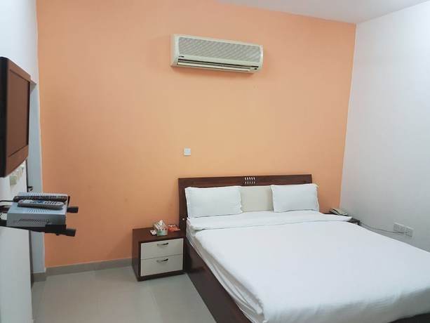 Imagen de la habitación del Hotel Danat Mazoon Apartments. Foto 10