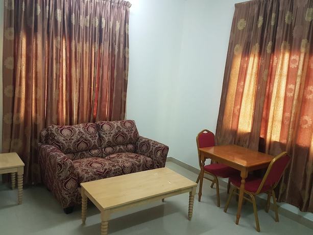 Imagen de la habitación del Hotel Danat Mazoon Apartments. Foto 12