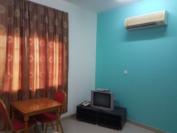 Imagen de la habitación del Hotel Danat Mazoon Apartments. Foto 13