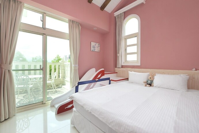 Imagen de la habitación del Hotel Dancing Butterfly Slide Family Inn. Foto 19