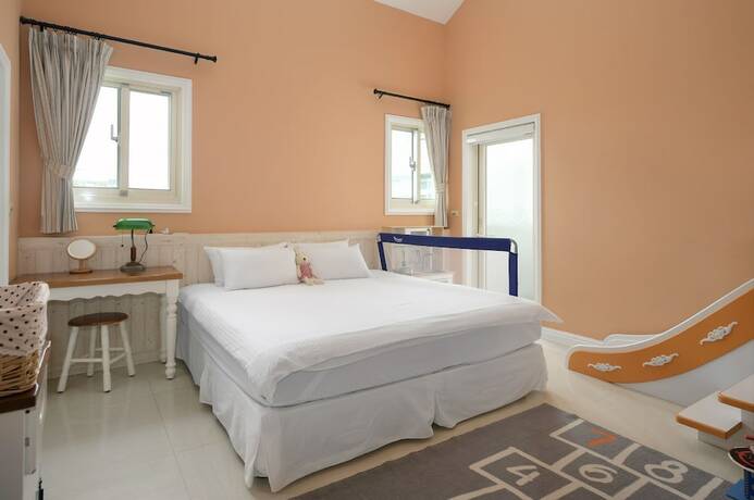 Imagen de la habitación del Hotel Dancing Butterfly Slide Family Inn. Foto 22