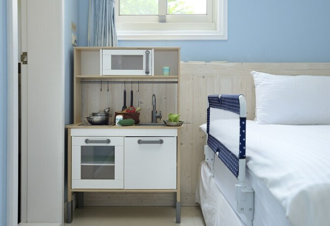 Imagen de la habitación del Hotel Dancing Butterfly Slide Family Inn. Foto 24