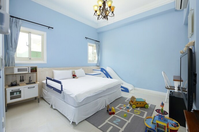 Imagen de la habitación del Hotel Dancing Butterfly Slide Family Inn. Foto 28